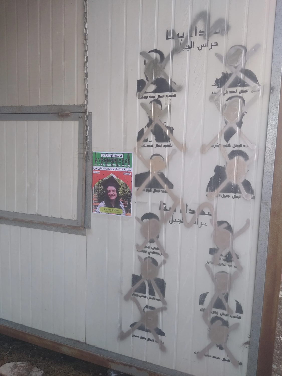 Posters of martyrs in Beita that have been crossed out by IOF soliders.