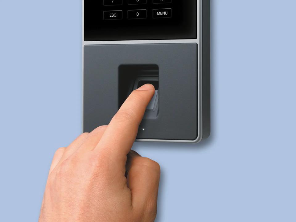 A biometric time clock to prevent workers from punching each other in and out.