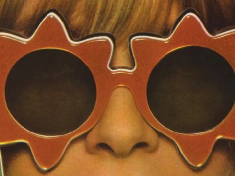 a "ye ye" girl with sunglasses frames in the shape of suns