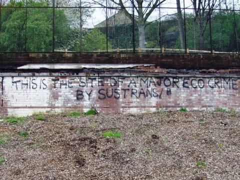 "this is the site of a major eco-crime by Sustrans" graffiti