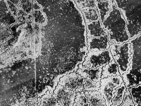 An aerial photograph showing opposing trenches and no man's land between Loos and Hulluch in France during World War I