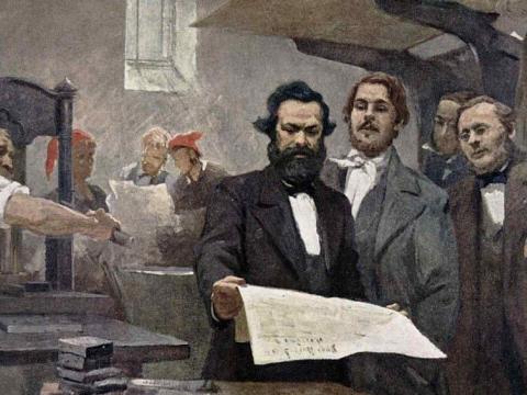 Painting of Karl Marx reading a newspaper with his friend and intellectual partner Friedrich Engels right beside him looking at it as well.