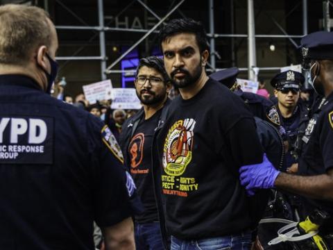A picture of current NYC mayoral candidate Zohran Mamdani being arrested at a protest in 2021.
