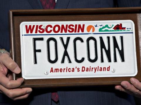 A car numberplate saying Wisconsin - Foxconn - America's Dairyland
