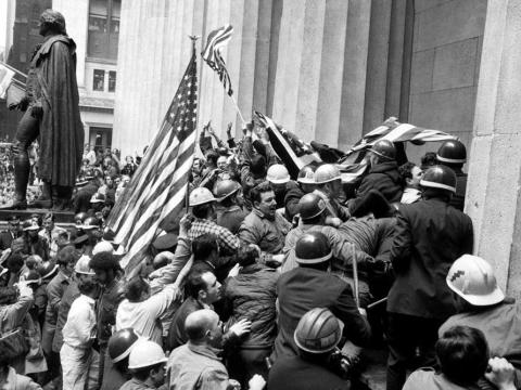 Hardhats storm city hall in 1970 in New York City during the Hardhat Riot.