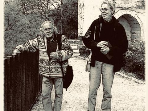 A photo of Jacques Camatte, leaning on the fence… on a day out, being interviewed by his far-right friends at Il Covile. He is next to Armando Ermini, an editor at Il Covile.