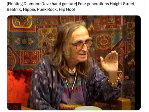 Diamond Dave telling a story and using his famous hand gesture.