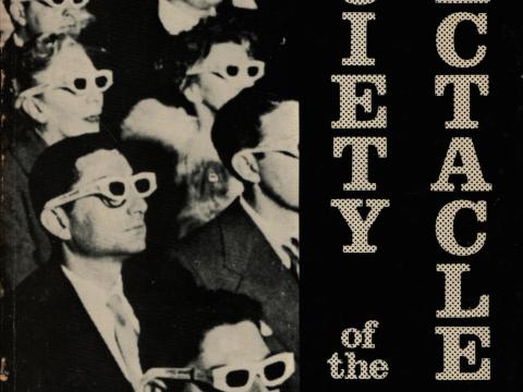 Society of the Spectacle - Guy Debord - cover of the 1983 edition showing a cinema audience wearing 3D glasses