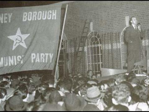 Phil Piratin addressing a meeting in 1945 with Stepney Communist Party banner