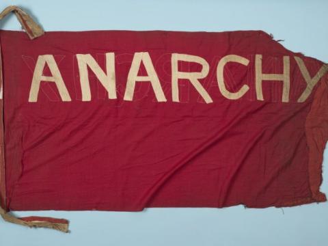 Flag carried by JW 'Chummy' Fleming at May Day marches in the late 19th and early 20th centuries.