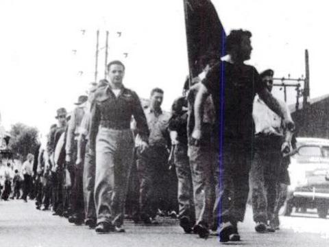 War veterans march in support of striking steelworkers in Pittsburgh, August 26,