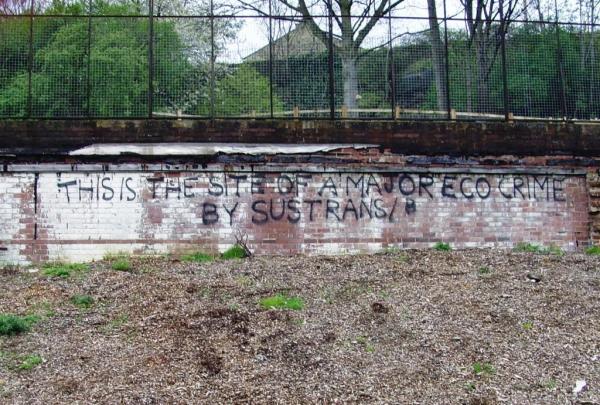 "this is the site of a major eco-crime by Sustrans" graffiti
