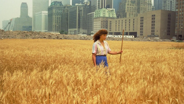 Agnes Denes in her "Wheatfield" in Lower Manhattan in 1982.