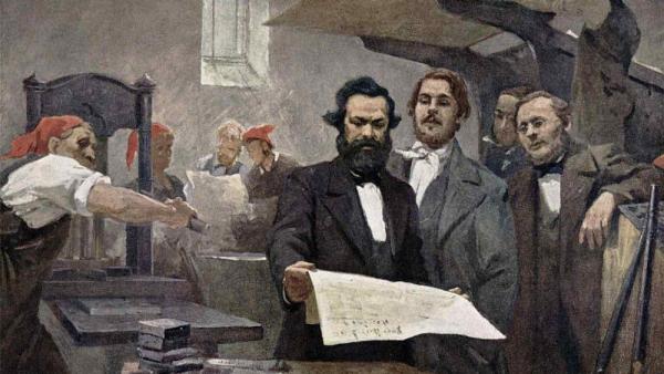 Painting of Karl Marx reading a newspaper with his friend and intellectual partner Friedrich Engels right beside him looking at it as well.