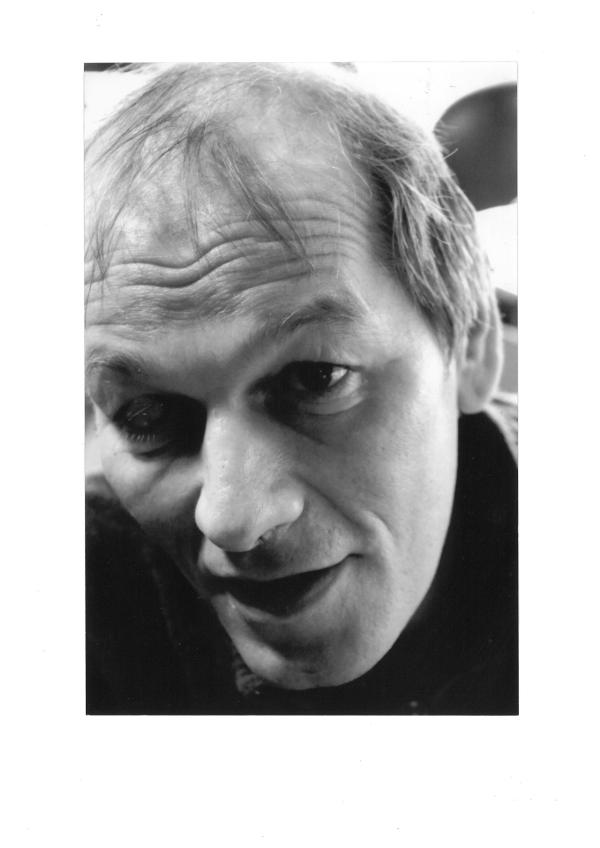 Black and white portrait photo of Jack De Montreuil from the 1990s.