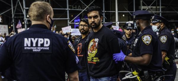 A picture of current NYC mayoral candidate Zohran Mamdani being arrested at a protest in 2021.