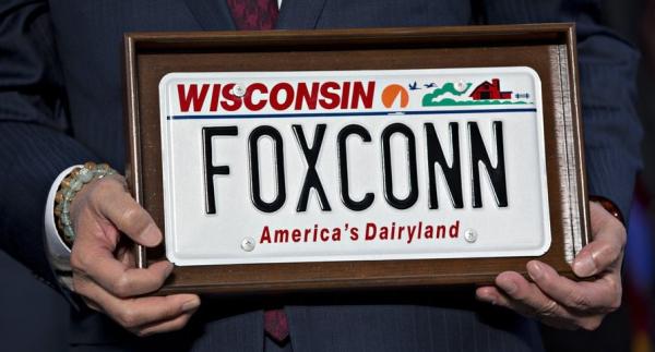 A car numberplate saying Wisconsin - Foxconn - America's Dairyland