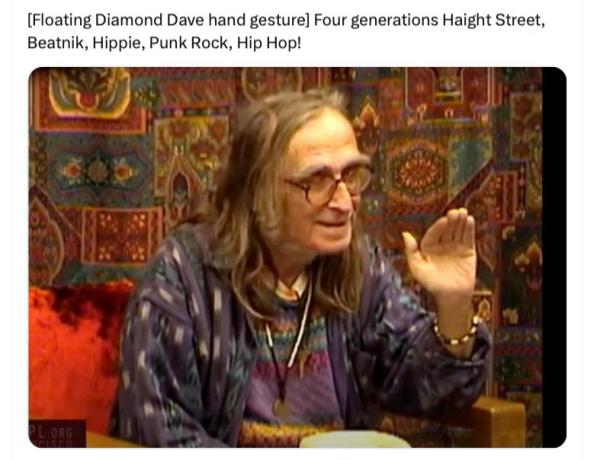 Diamond Dave telling a story and using his famous hand gesture.