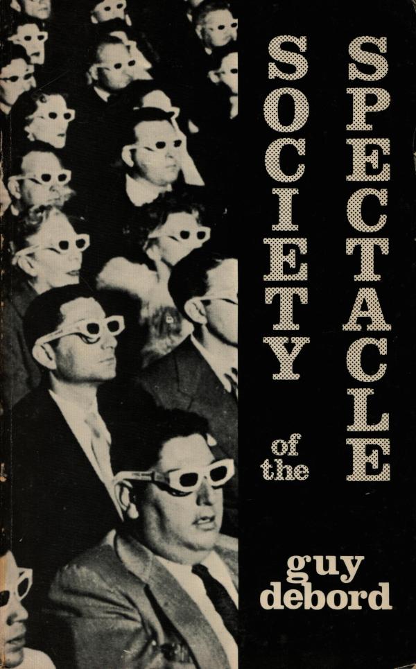 Society of the Spectacle - Guy Debord - cover of the 1983 edition showing a cinema audience wearing 3D glasses