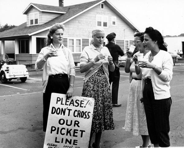Kheel Center Four female members of ILGWU Local 221 drinking coffee as they picket https://www.flickr.com/photos/kheelcenter/5279669440 CC BY 2.0 https://creativecommons.org/licenses/by/2.0/