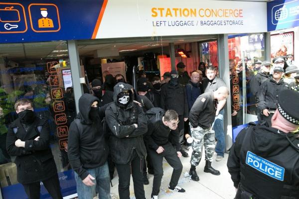 NA members outside the left luggage in Lime Street station