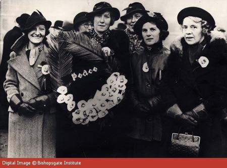 cooperative womens guild members with white poppy wreath