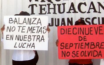 Mexican factory workers protest against their sackings Mexican factory workers protest against their sackings